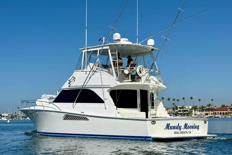 Slide: The Image of 2002 Viking 48 Convertible yacht on calm water, Seal Beach, CA. - 4