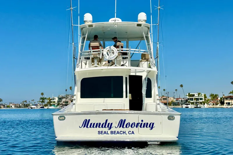 Slide: The Image of 2002 Viking 48 Convertible yacht "Mundy Mooring" in Seal Beach, CA, on a sunny day. - 7