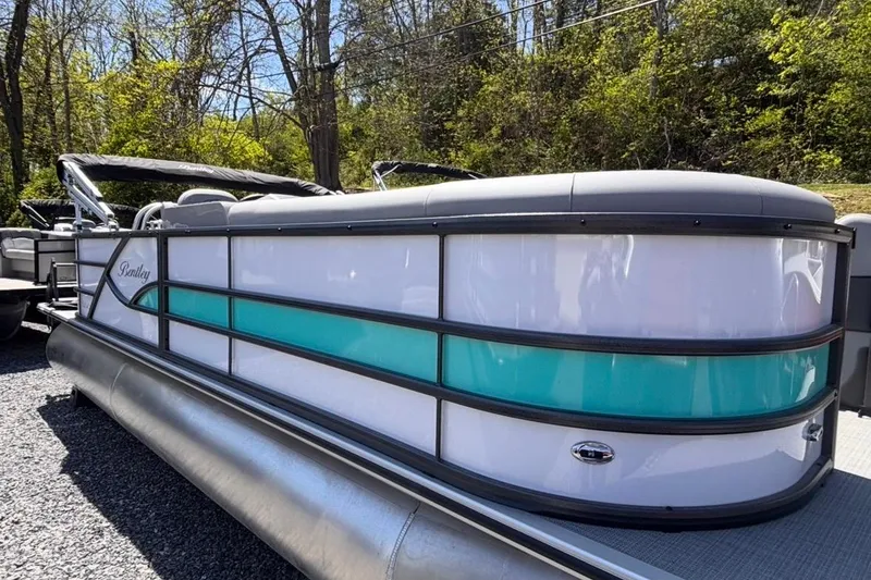 The Image of 2026 Bentley Pontoons Legacy 220 Cruise XL with sleek design, parked outdoors. - 0
