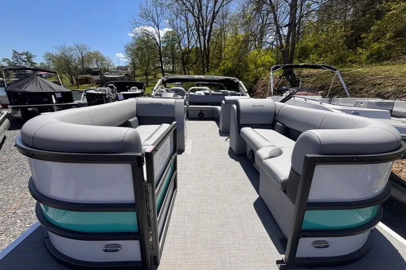 Slide: The Image of 2026 Bentley Pontoons Legacy 220 Cruise XL with spacious seating and modern design. - 2