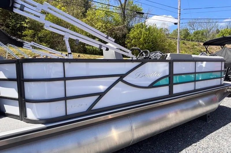 Slide: The Image of 2026 Bentley Pontoons Legacy 220 Cruise XL pontoon boat with sleek design and modern features. - 3