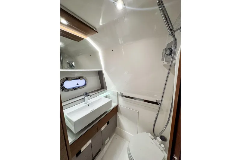 Slide: The Image of Luxurious 2022 Tiara Yachts 43 LS bathroom with modern fixtures and sleek design. - 18