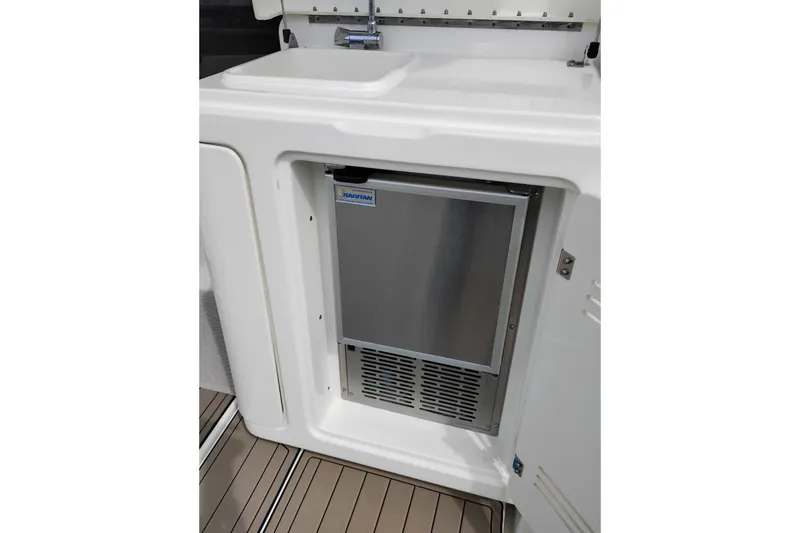 Slide: The Image of 2005 Silverton 38 Convertible yacht with built-in Raritan ice maker. - 16