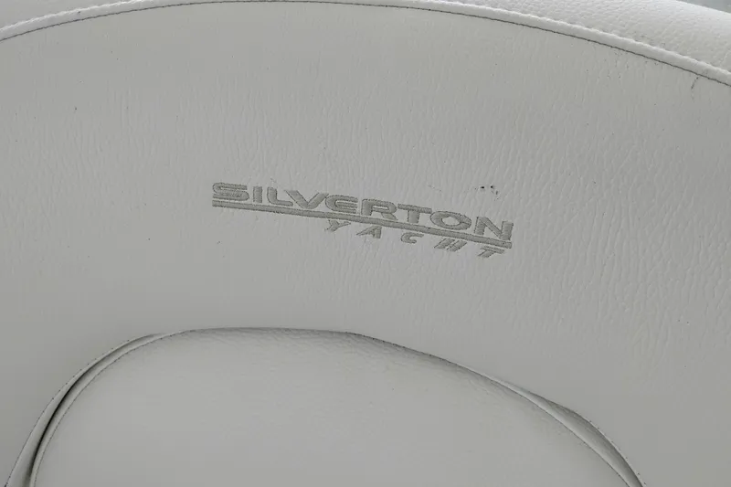 Slide: The Image of White leather seat with "Silverton Yacht" logo, from a 2005 Silverton 38 Convertible. - 35