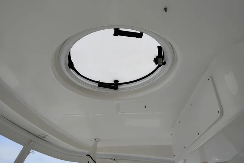 Slide: The Image of Circular hatch on 2005 Silverton 38 Convertible yacht ceiling. - 38