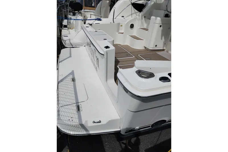 Slide: The Image of 2005 Silverton 38 Convertible yacht with spacious deck and modern design. - 5