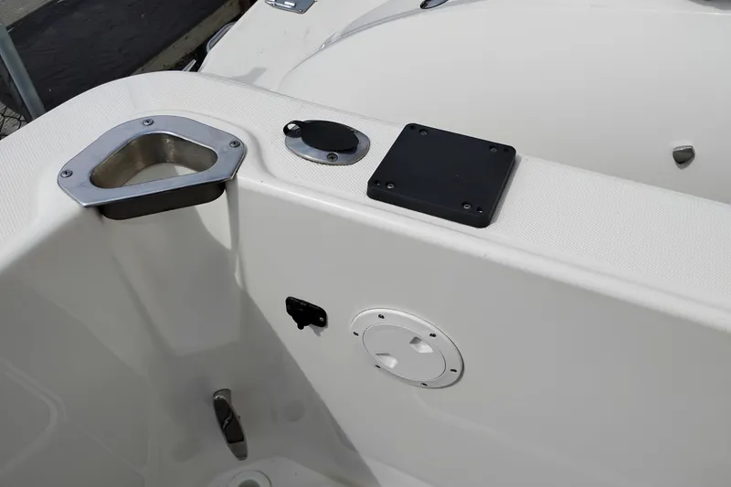 Slide: The Image of 2005 Silverton 38 Convertible boat deck with cup holder and fittings. - 7