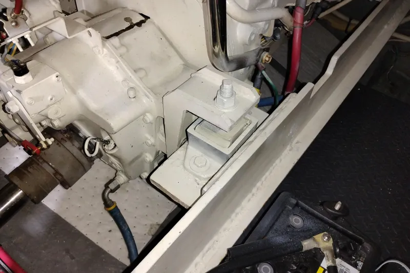 Slide: The Image of Engine compartment of 2005 Silverton 38 Convertible boat, showing mechanical components and wiring. - 93