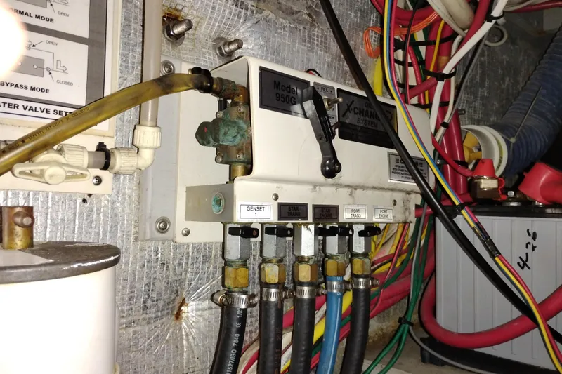 Slide: The Image of Engine room wiring and control panel of a 2005 Silverton 38 Convertible boat. - 94