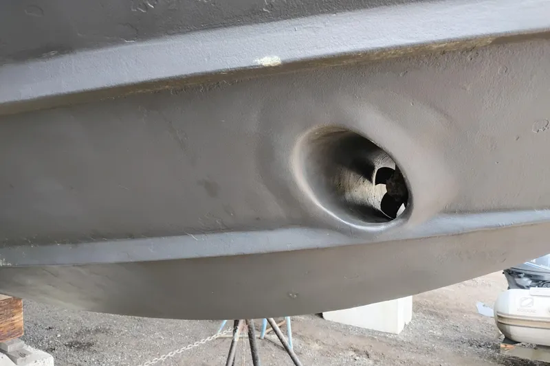 Slide: The Image of Close-up of 2005 Silverton 38 Convertible boat hull with visible propeller. - 95