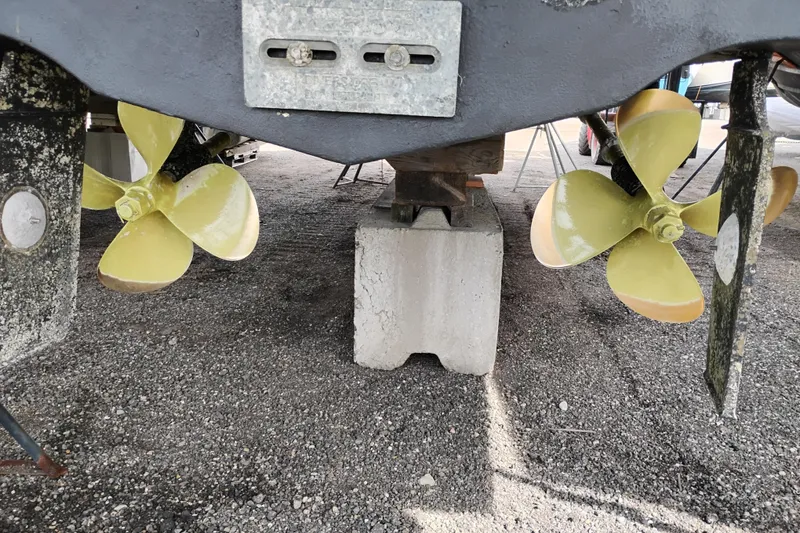 Slide: The Image of Propellers of a 2005 Silverton 38 Convertible boat on dry dock. - 96