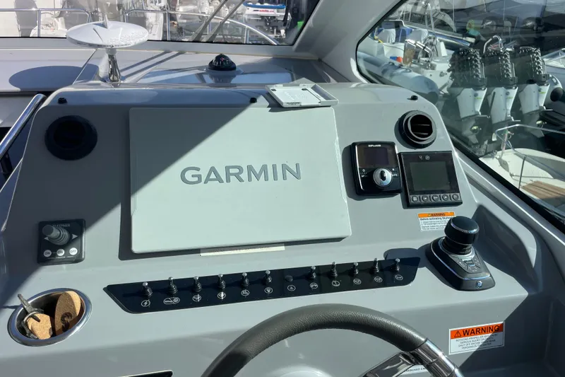 Slide: The Image of 2023 Beneteau Gran Turismo 32 yacht bathroom with modern toilet and sink. - 6