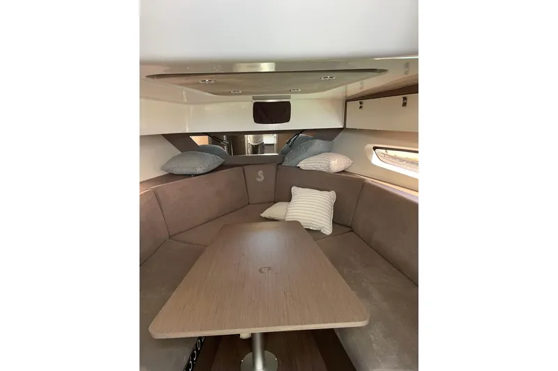 Slide: The Image of 2023 Beneteau Gran Turismo 32 bathroom interior with sink and window view. - 7