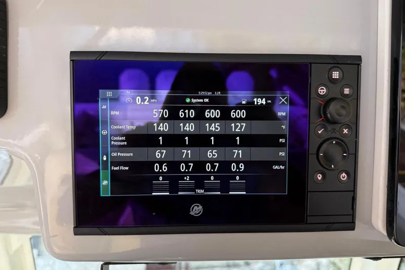 Slide: The Image of Dashboard display of a 2021 Boston Whaler 380 Outrage showing engine metrics. - 12