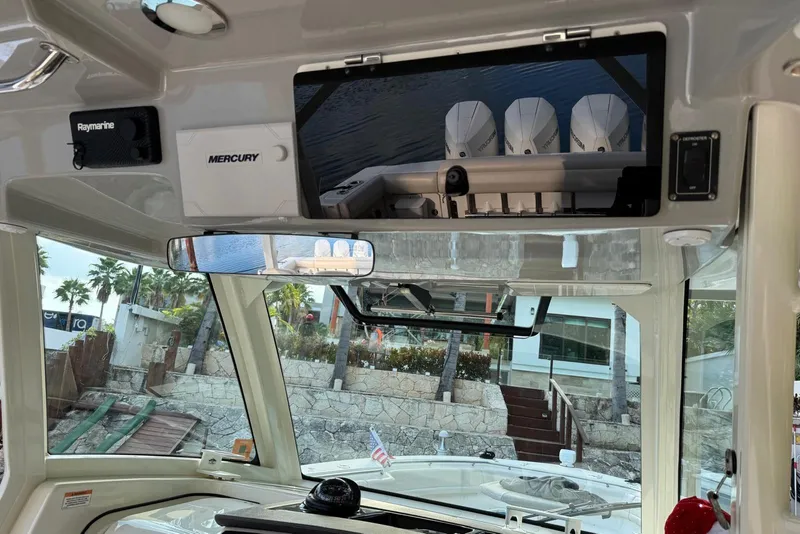 Slide: The Image of Interior view of a 2021 Boston Whaler 380 Outrage boat with Mercury controls. - 9