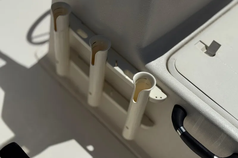 Slide: The Image of Rod holders on a 2024 Carolina Skiff E18 JVX CC boat deck. - 15