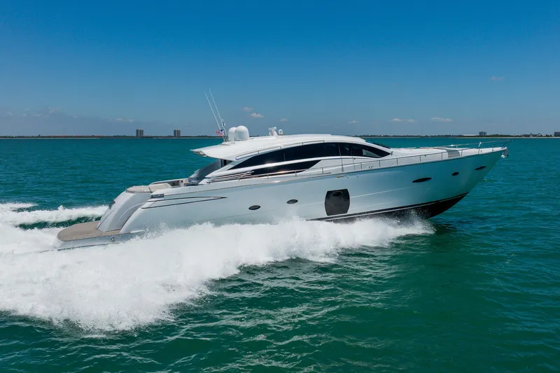 The Image of Luxury 2010 Pershing 80 yacht cruising on clear blue ocean waters. - 0