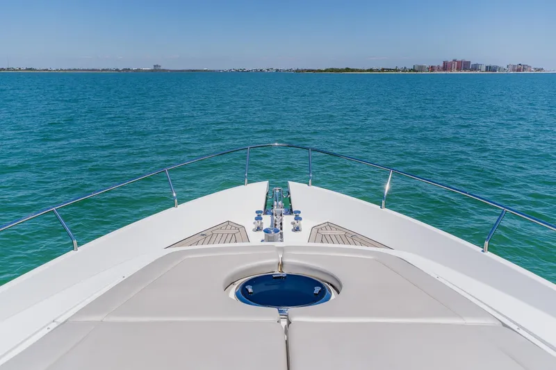 Slide: The Image of Bow view of 2010 Pershing 80 yacht cruising on open sea. - 109