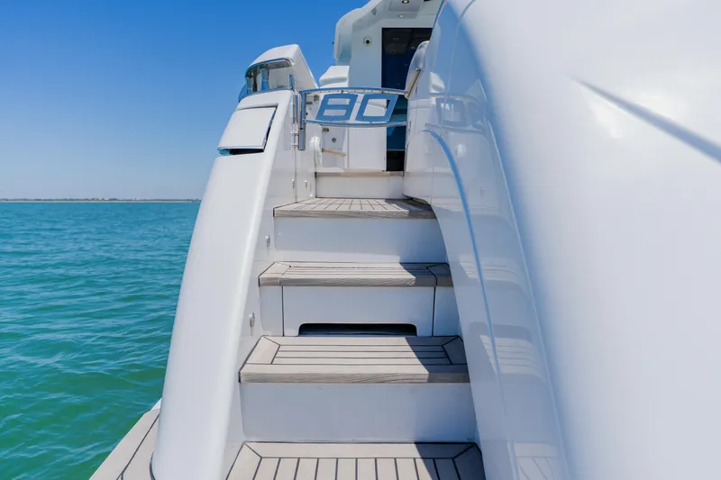 Slide: The Image of Staircase on a 2010 Pershing 80 yacht with ocean view. - 15