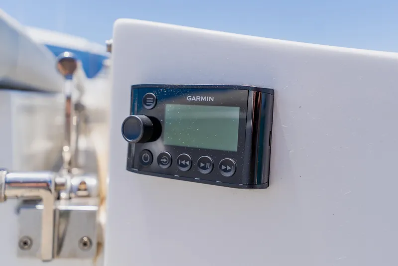 Slide: The Image of Garmin control panel on 2010 Pershing 80 yacht, mounted on white surface. - 18