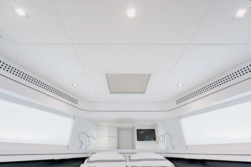 Slide: The Image of Luxurious interior of 2010 Pershing 80 yacht, featuring modern design and spacious layout. - 42