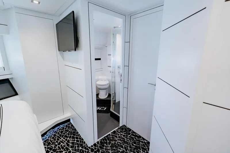 Slide: The Image of Luxurious interior of 2010 Pershing 80 yacht featuring modern bathroom and sleek design. - 44