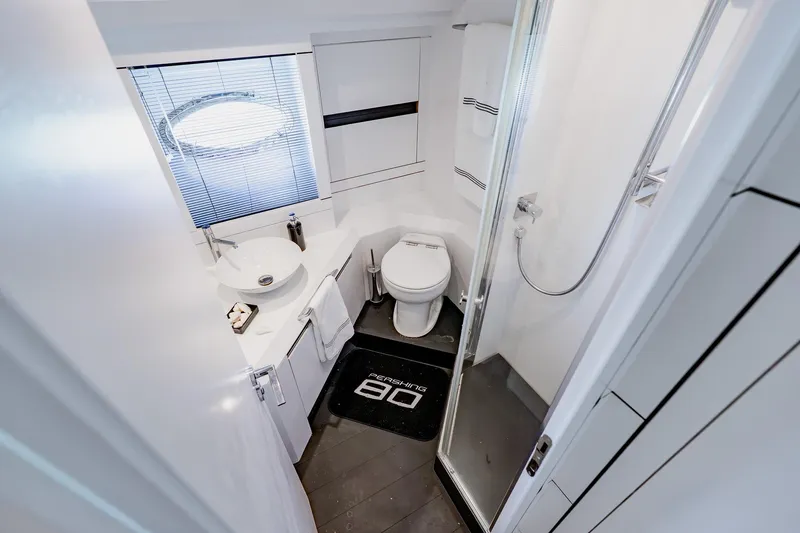 Slide: The Image of Luxurious bathroom in 2010 Pershing 80 yacht with modern fixtures and sleek design. - 45