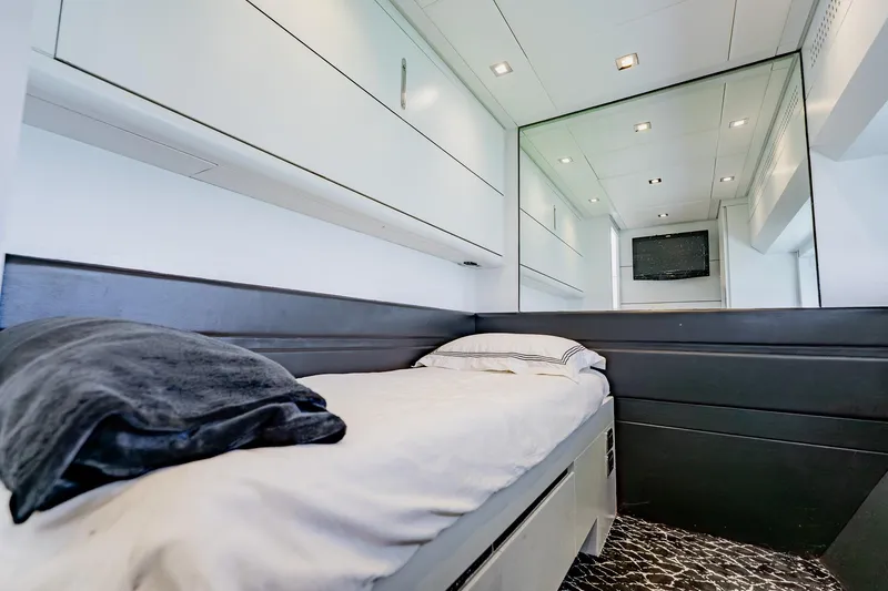 Slide: The Image of Luxurious cabin interior of 2010 Pershing 80 yacht with modern design and sleek finishes. - 57