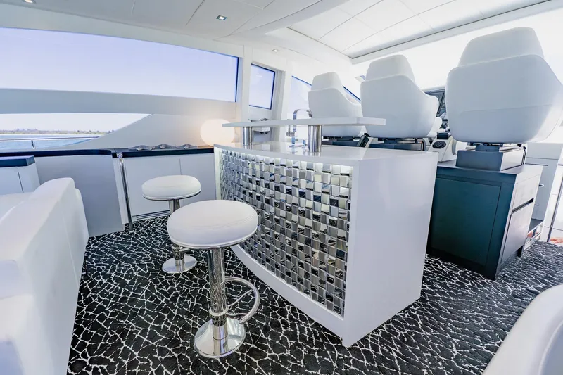 Slide: The Image of Luxurious interior of 2010 Pershing 80 yacht with modern seating and stylish decor. - 65