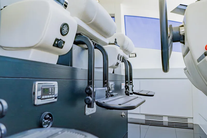 Slide: The Image of Interior view of 2010 Pershing 80 yacht cockpit with modern controls and seating. - 71
