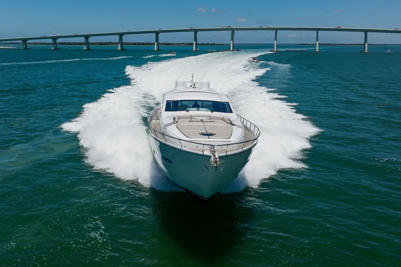 Slide: The Image of Luxury Pershing 80 yacht cruising swiftly under a bridge, 2010 model. - 8