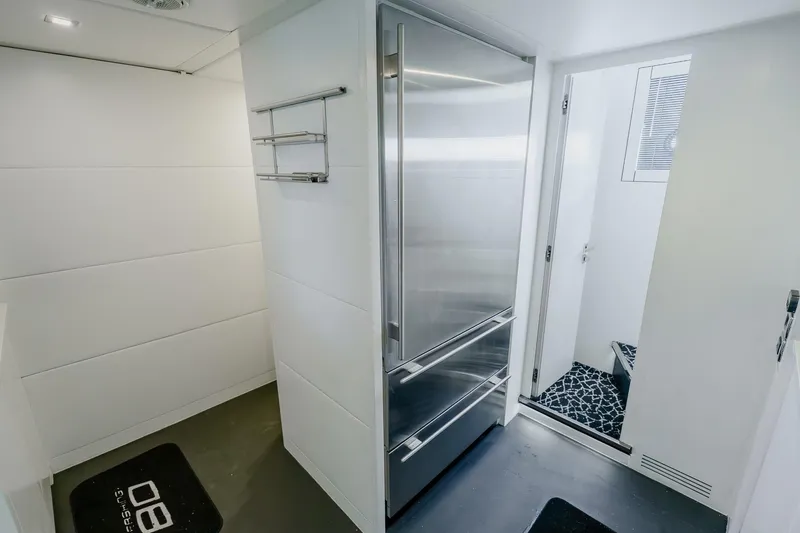 Slide: The Image of Modern interior of 2010 Pershing 80 yacht with sleek stainless steel appliances. - 83