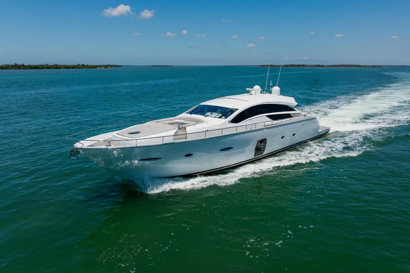 Slide: The Image of Luxurious 2010 Pershing 80 yacht cruising on clear blue waters under a sunny sky. - 9