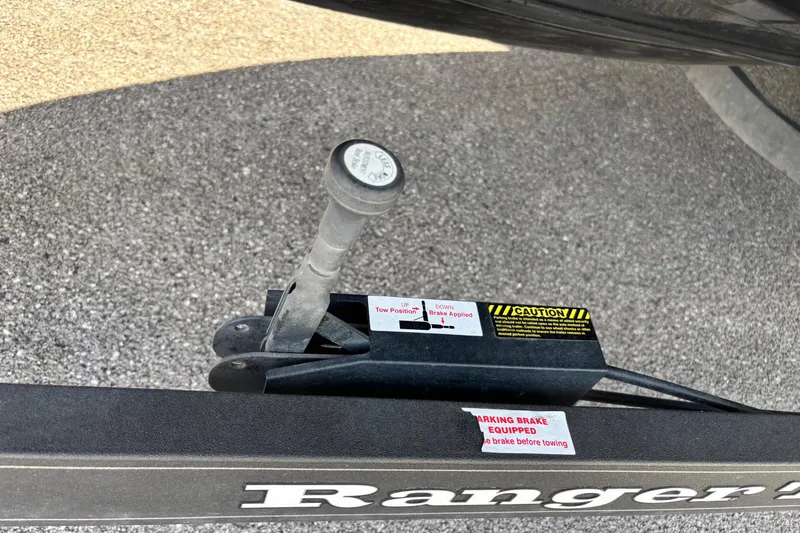 Slide: The Image of Trailer brake lever on a 2021 Ranger Z520C Cup-Equipped boat trailer. - 3