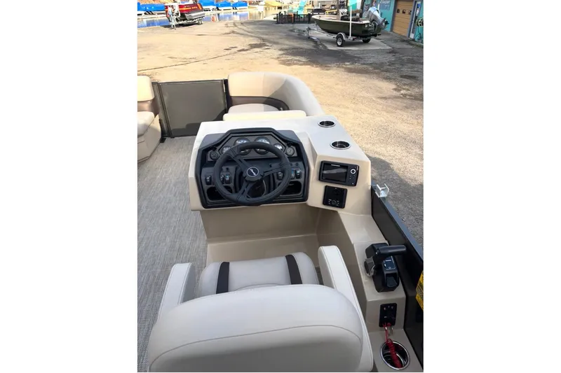 Slide: The Image of Interior view of 2026 Bentley Pontoons Fish 220 N-Cruise boat cockpit. - 8