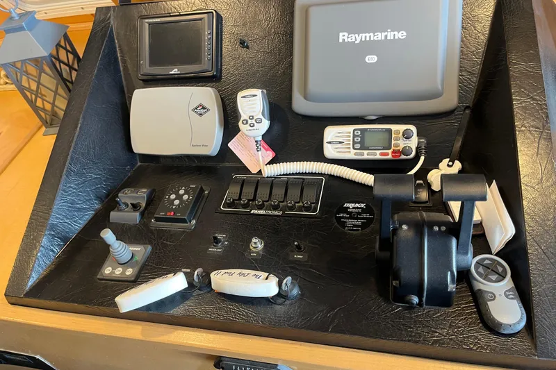 Slide: The Image of Control panel of a 2005 Majestic Legacy boat with navigation and communication equipment. - 10