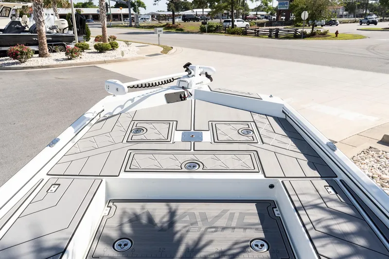 Slide: The Image of Deck view of 2026 Avid 207 Recon boat, featuring sleek design and modern fittings. - 11