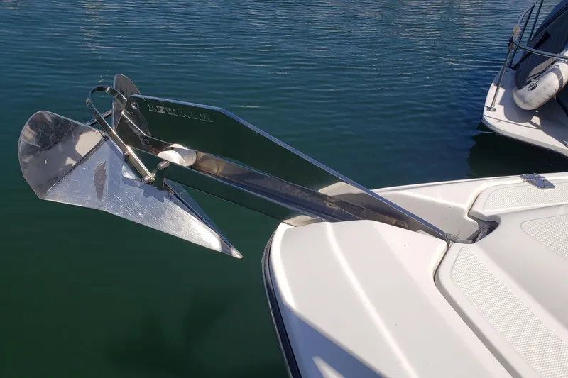 Slide: The Image of 2019 Rinker EX 370 boat with Lewmar anchor in calm water. - 16