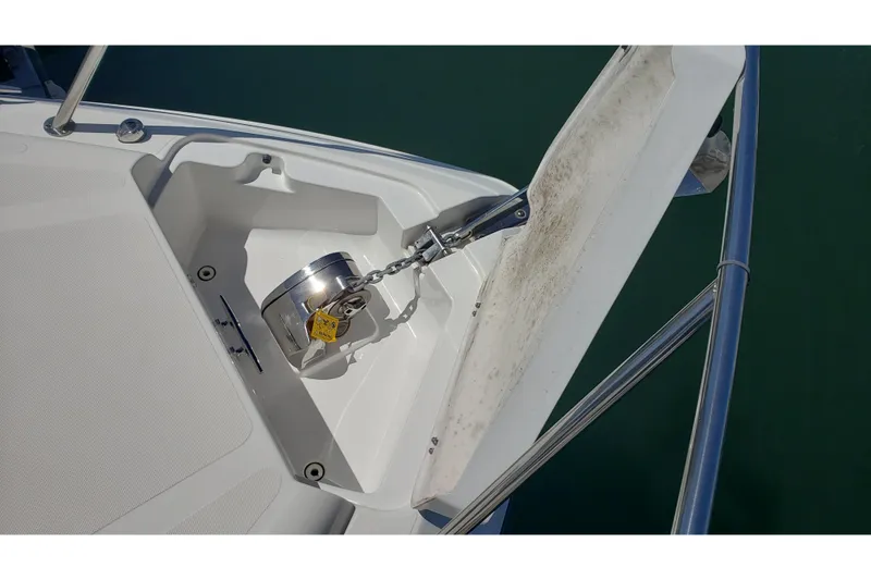 Slide: The Image of Anchor chain mechanism on 2019 Rinker EX 370 boat deck. - 17