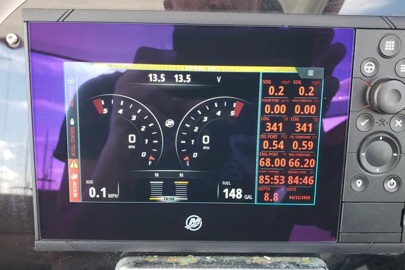 Slide: The Image of Dashboard display of a 2019 Rinker EX 370 boat showing speed, fuel, and engine data. - 30