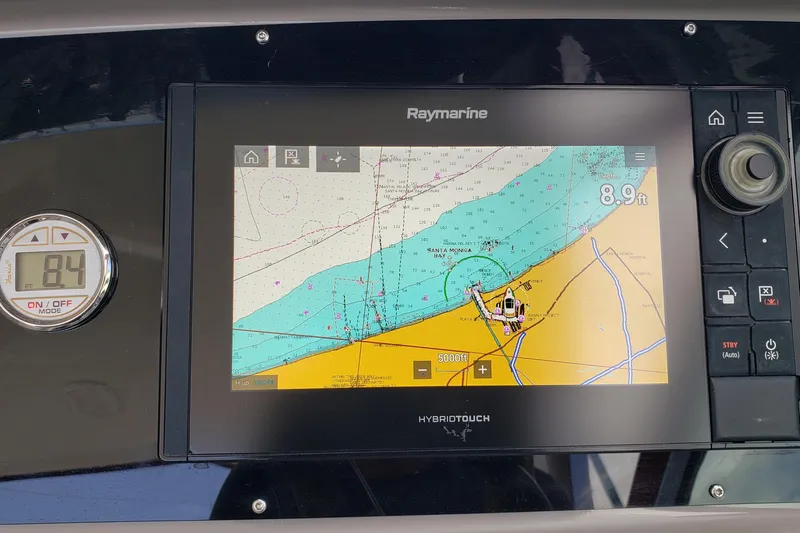 Slide: The Image of Raymarine navigation display on 2019 Rinker EX 370 boat, showing nautical chart and depth. - 31