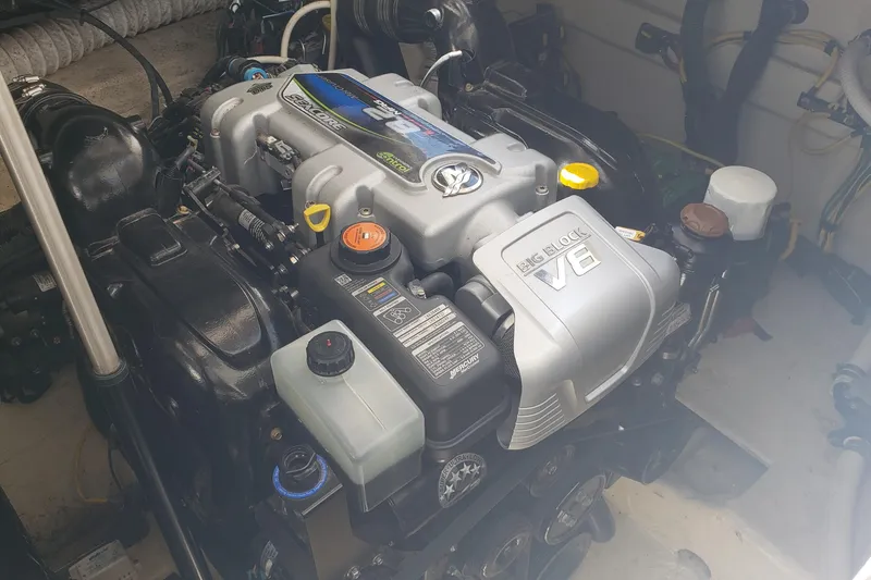 Slide: The Image of Engine compartment of a 2019 Rinker EX 370 with a big block V8 engine. - 64