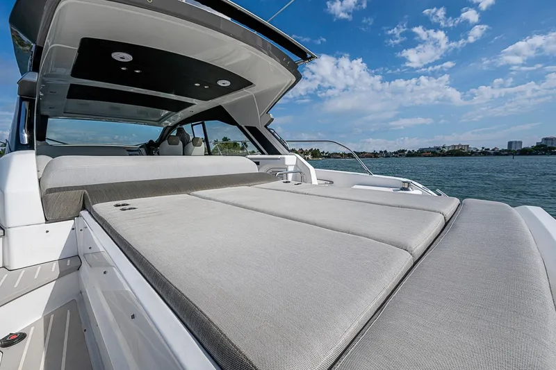 Slide: The Image of Luxurious 2019 Azimut Atlantis 51 yacht with spacious sunbed and scenic ocean view. - 17