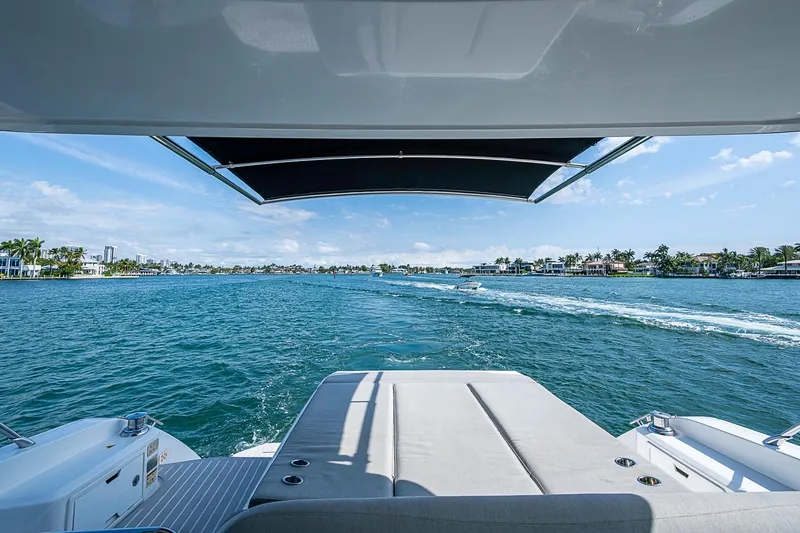 Slide: The Image of Azimut Atlantis 51 yacht, 2019 model, cruising on a sunny day with coastal view. - 19