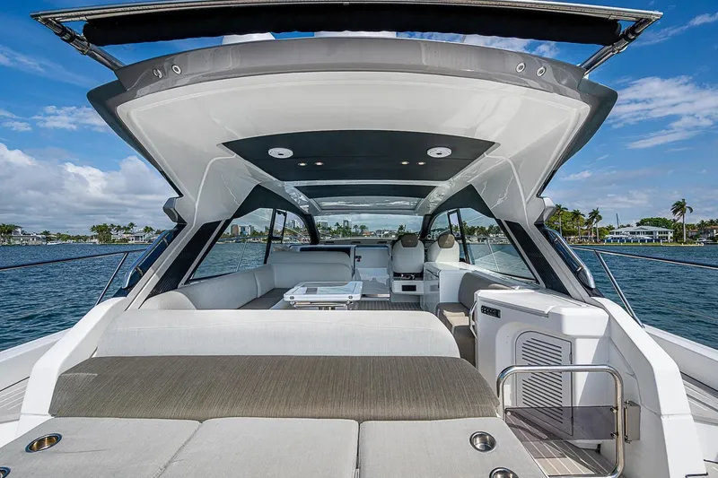 Slide: The Image of Luxurious 2019 Azimut Atlantis 51 yacht interior with spacious seating and scenic ocean view. - 25