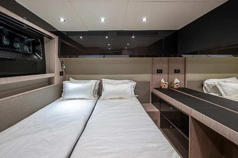 Slide: The Image of Luxurious interior of 2019 Azimut Atlantis 51 yacht with twin beds and modern design. - 42