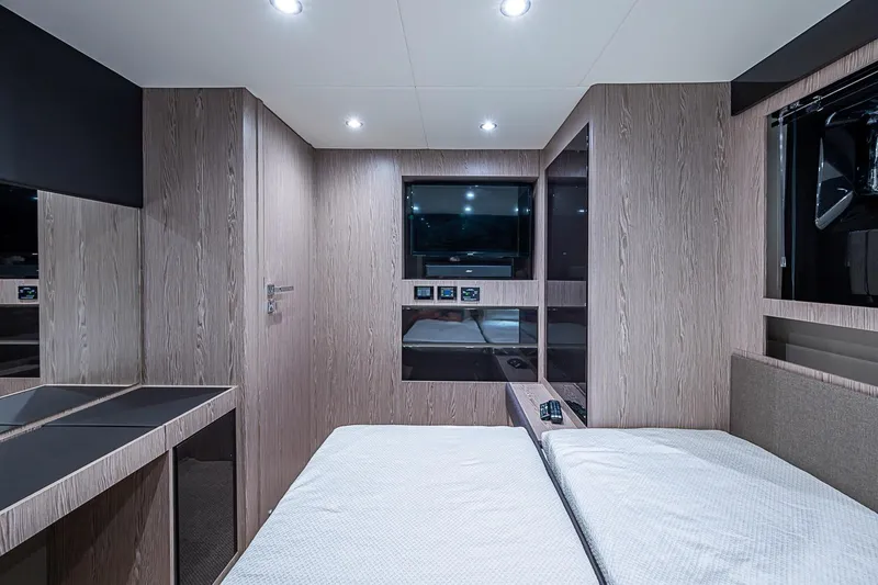 Slide: The Image of Luxurious interior cabin of 2019 Azimut Atlantis 51 yacht with modern wood finish. - 44