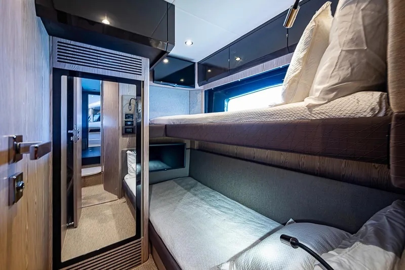 Slide: The Image of Interior of 2019 Azimut Atlantis 51 yacht with cozy bunk beds and modern design. - 45