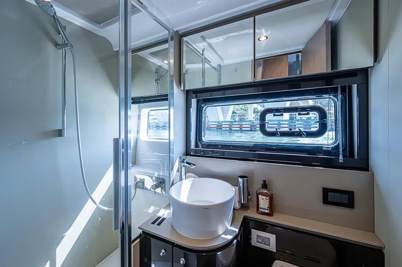 Slide: The Image of Luxurious bathroom interior of 2019 Azimut Atlantis 51 yacht with modern fixtures. - 46