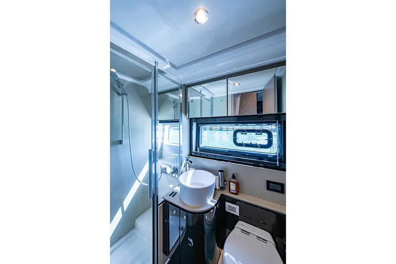 Slide: The Image of Luxurious bathroom interior of 2019 Azimut Atlantis 51 yacht with modern fixtures. - 47